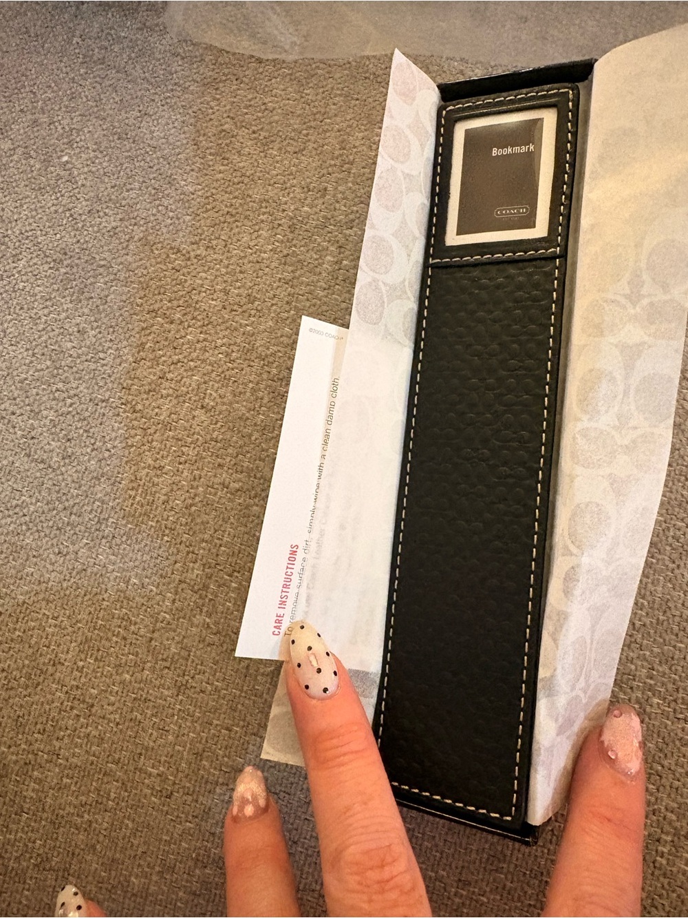 Coach Black Pebbled Leather Bookmark with White Stitching